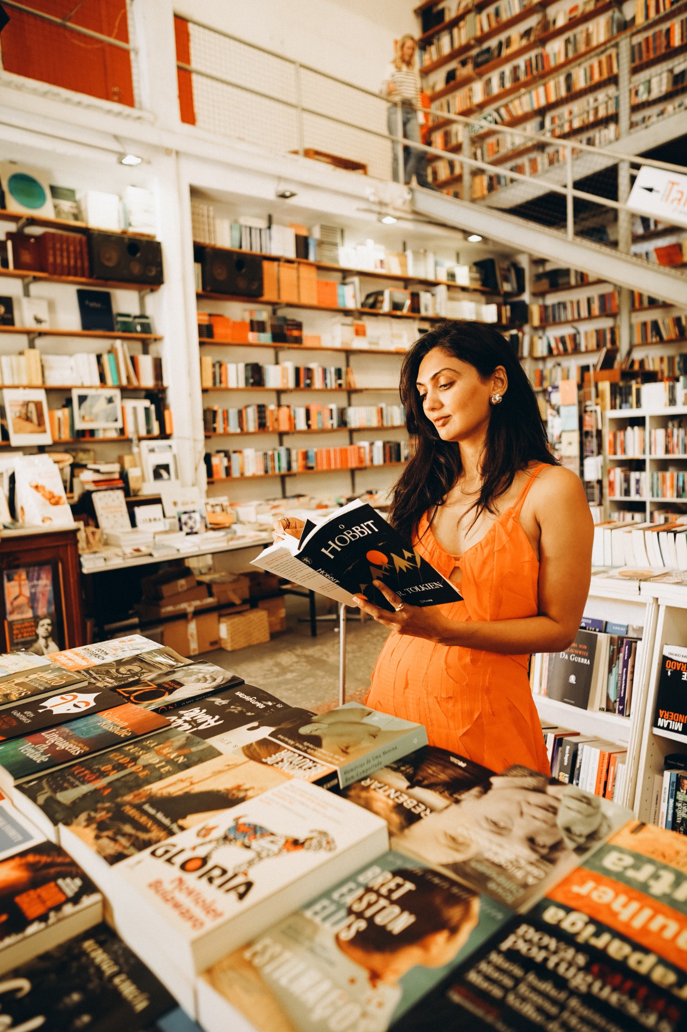 Bijal reading in a bookstore